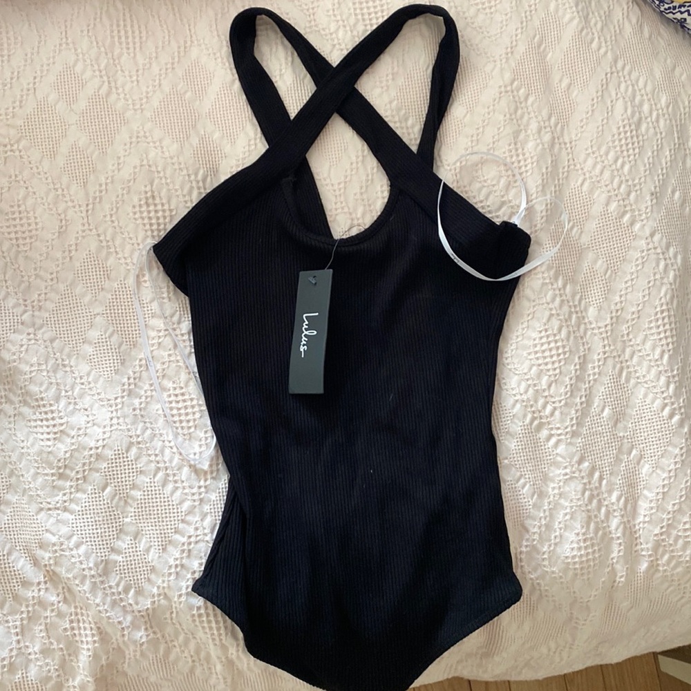 Never worn with tags Lulus black bodysuit